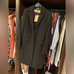 Women’s Burberry coat, New.